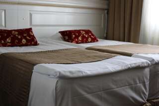 Отель Hotel Golden Dome Iisalmi Ийсалми Улучшенный семейный номер-1